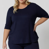 This navy blue tee top with 3/4 sleeves looks great as plus size sleepwear. Worn by a size 18 woman, this curve top makes for a comfortable pyjama top and being breathable and thermo-regulating, it's a great top for night sweats and hot flushes. 