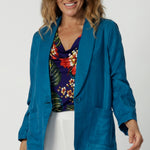 Teal blazer is made from breathable, lightweight linen fabric, making them an ideal choice for travel. Crafted in Australia for woman in Australia and New Zealand. Light weight blazer combines style and comfort. Travel ready piece pairs back with white Connor Pant. Shop sizes 8-24 at clothing brand Leina & Fleur.