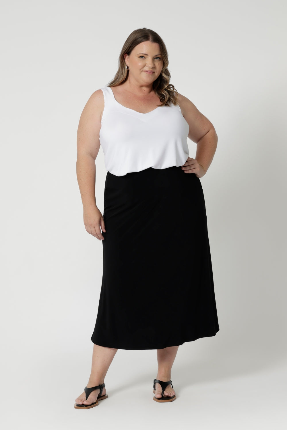 Available in sizes 8-24, this Australian-made skirt is tailored to fit both petite and plus sizes, ensuring a flattering fit for all body types. It's your go-to piece for traveling in style and comfort, whether you're at home or on the go. Available in sizes 8-24.