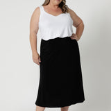 Available in sizes 8-24, this Australian-made skirt is tailored to fit both petite and plus sizes, ensuring a flattering fit for all body types. It's your go-to piece for traveling in style and comfort, whether you're at home or on the go. Available in sizes 8-24.