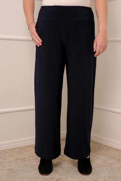 Straight, wide-leg navy pants cut in petite length. These petite length work pants are comfortable in pull-on jersey fabric and are Australian-made in sizes 8 to 24.