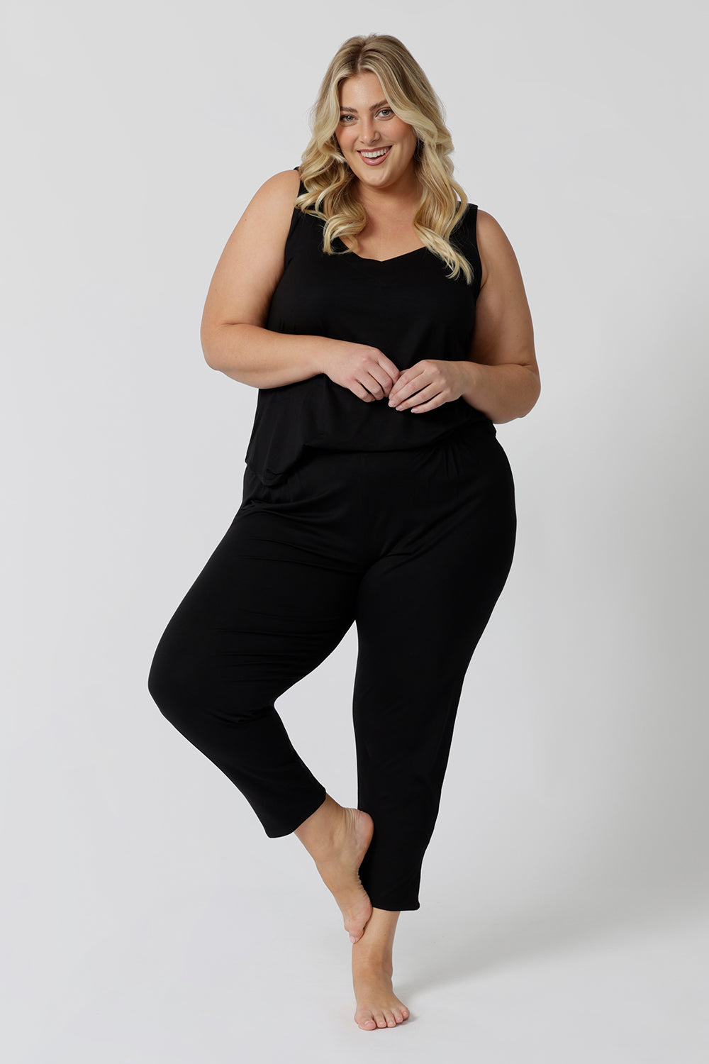 A good loungewear pant for curvy women, these comfortable  tapered leg lounge pants make great pyjama pants. Worn with black bamboo cami top, this is a breathable, thermo-regulating pyjama set and makes get sleepwear for night sweats and hot flushes. Shop loungewear sets online at L&F Australia.