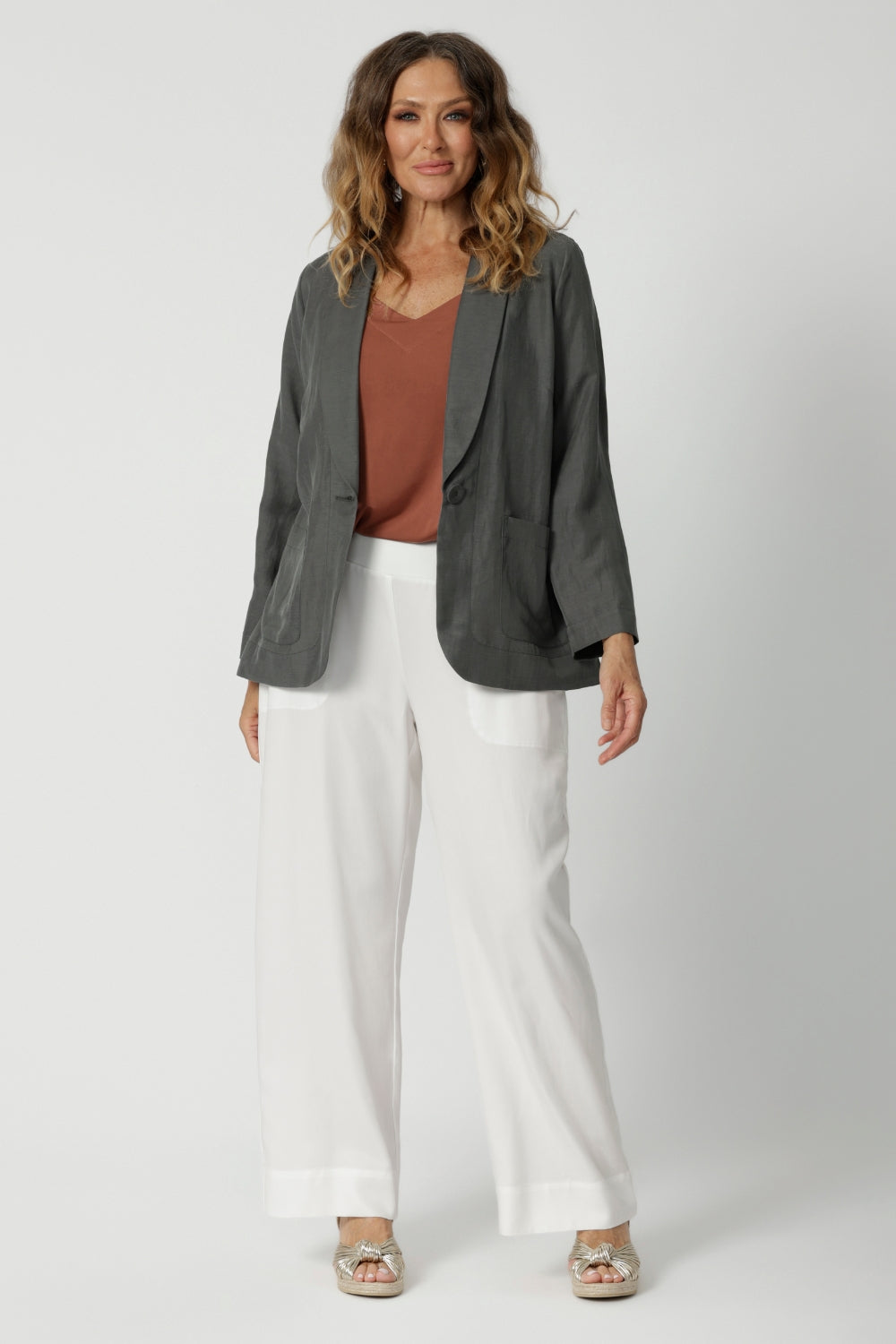 Light weight blazer is Australian made using a fabric mix of linen, cupro and tencel. Breathable blazer design  allows you to stay comfortable and cool in any climate. Linen blazer is ideal for travel. Tailored fit ensures versatility for both casual and formal occasions. Shop this summer ready blaze in sizes 8-24. 