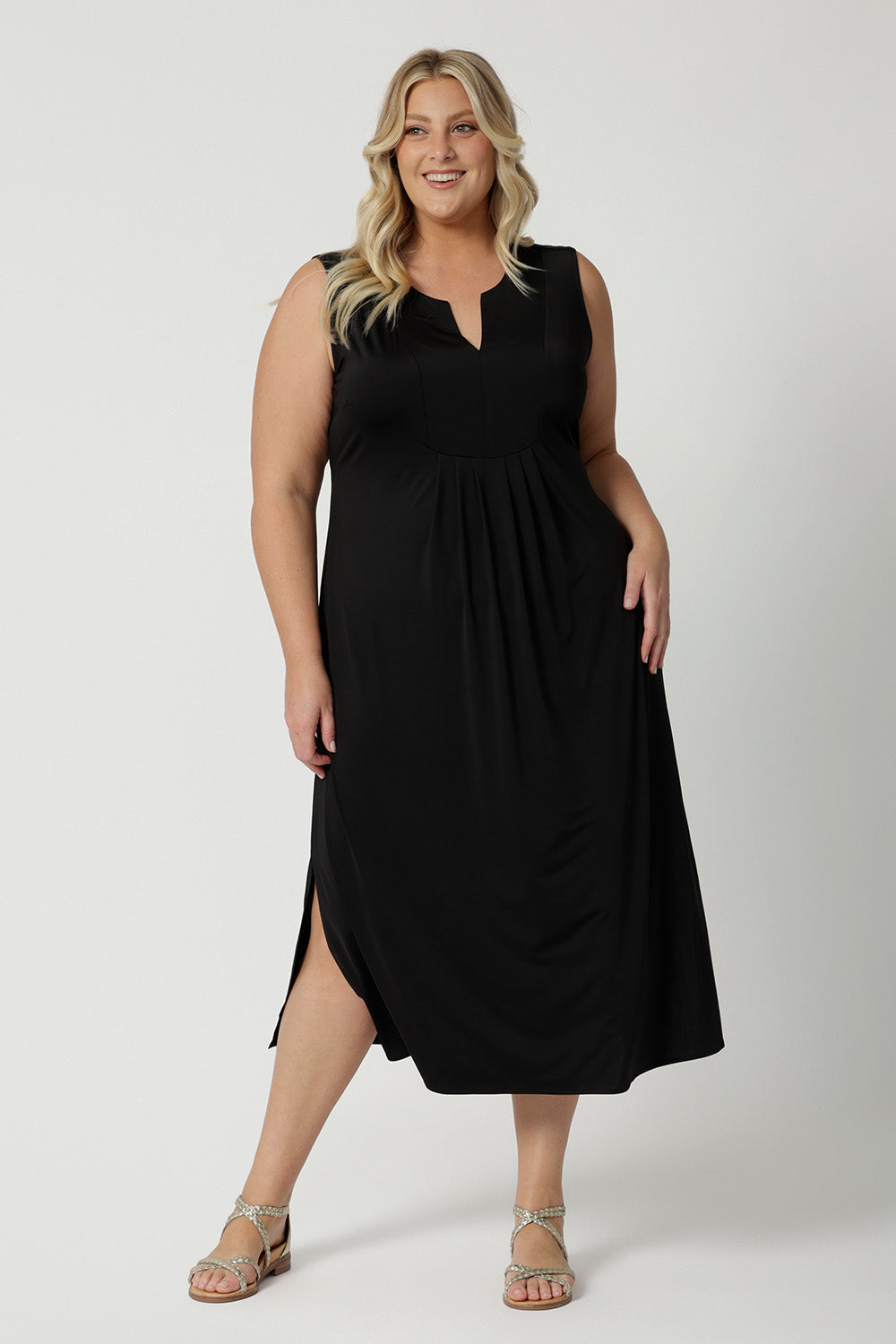 Women's plus size black jersey dress  Shown on a size 18, this sleeveless black dress is made in Australia by Australian and New Zealand women's fashion brand, L&F. Shop plus size summer dresses online in size 8 to 24.