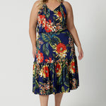 A good midi dress for summer, this printed jersey dress has a halter neck and ruffle hem. A perfect dress for cruise holidays and resort style, this maxi dress is easy-care and crease-resistant. Made in Australian by Australian and New Zealand women's clothes brand, Leina & Fleur. Shop their cruise wear fashions online in sizes 8 to 24.