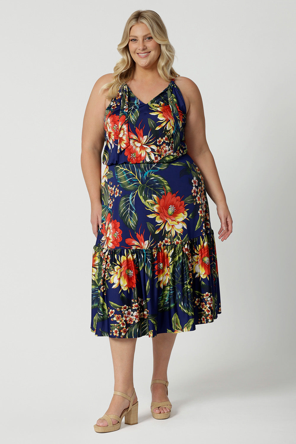 A good midi dress for summer, this printed jersey dress has a halter neck and ruffle hem. A perfect dress for cruise holidays and resort style, this maxi dress is easy-care and crease-resistant. Made in Australian by Australian and New Zealand women's clothes brand, Leina & Fleur. Shop their cruise wear fashions online in sizes 8 to 24.