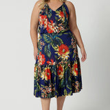 A good midi dress for summer, this printed jersey dress has a halter neck and ruffle hem. A perfect dress for cruise holidays and resort style, this maxi dress is easy-care and crease-resistant. Made in Australian by Australian and New Zealand women's clothes brand, Leina & Fleur. Shop their cruise wear fashions online in sizes 8 to 24.