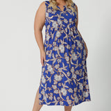 Style your off-duty wardrobe this summer with sleeveless floral print print dress in slinky jersey fabric. Made in Australia by Australian and New Zealand women's clothing brand, Leina & Fleur, this summer dress for plus size women is an empire line dress style. A midi-length dress too, shop womens dresses Australia online in size 8 to 24.