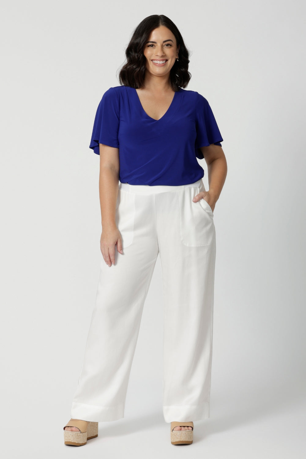 These white summer pants are crafted from lightweight lyocell fabric, perfect for staying cool in the Australian heat. Designed with a wide leg silhouette, they offer a relaxed and breezy fit. Ideal choice for casual outings or beach days. Made in Australia, these pants combine style and comfort, showcasing quality craftsmanship that celebrates local production. Leina & Fleur stock sizes 8-24.