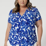 Plus sized model wears lightweight, dry-touch jersey fabric that has been designed to keep you cool, while the added stretch appeal ensures a comfortable fit that moves with you throughout the day. Available in sizes 8-24.