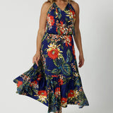 Size 12 model wears summer ready dress. Maxi Dress is made of Comfortable and easy care fabric. Dress is Australian made for women size 8-24. Leina & Fleur is a woman's fashion brand that stocks petite and plus sizes. 