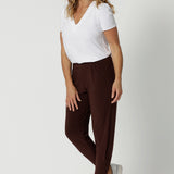 Good off duty pants for over 40s style. These tapered leg pants by Australian and New Zealand women's clothing brand, Leina & Fleur are comfortable stretchy pants in espresso brown jersey fabric. Shop pants for petite height women online in sizes 8 to 24.