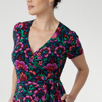 The fully functioning wrap style includes extended waist ties for a customizable fit, while the double-layer back bodice offers added comfort and structure.