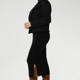 Crafted as a double-layer tube skirt, it features a soft folded waistband and a comfortable pull-on style, combining elegance with ease of wear.