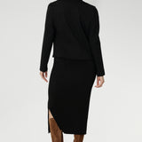 Mid-calf length skirt with a flattering side-split, making it perfect for both work and events. Crafted as a double-layer tube skirt, it features a soft folded waistband and a comfortable pull-on style.