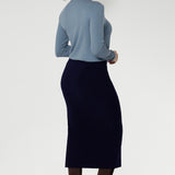 Elevate your wardrobe with the sophisticated Andi Midi Skirt in Navy, designed to keep you both work- and event-ready. Crafted from a navy dry-touch jersey fabric, this skirt offers a soft stretch for all-day comfort.