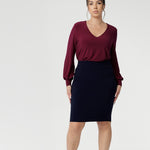 Petite height model wears double-layer tube skirt. Designed to ensure a flattering fit, while the soft folded waistband adds extra comfort. The Andi Tube Skirt is available in a mini length, regular and midi length for a bold and stylish look no matter your style.