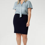 Crafted from a navy dry-touch jersey fabric with a soft stretch, this skirt offers both comfort and style. The double-layer design ensures a flattering fit, while the soft folded waistband adds extra comfort. Featuring a convenient pull-on style, the Andi Tube Skirt is available in a mini length for a bold and stylish look.