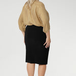Convenient pull-on style skirt, the Andi Tube Skirt offers a flattering regular length that pairs effortlessly with any wardrobe whether casual or corporate.
