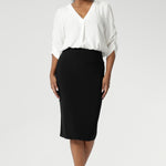 Now available in three lengths, this skirt is crafted from a black dry-touch jersey fabric with a soft stretch for ultimate comfort. Featuring a double-layer tube design, a soft folded waistband, and a convenient pull-on style, the Andi Tube Skirt offers a flattering regular length that pairs effortlessly with any wardrobe.