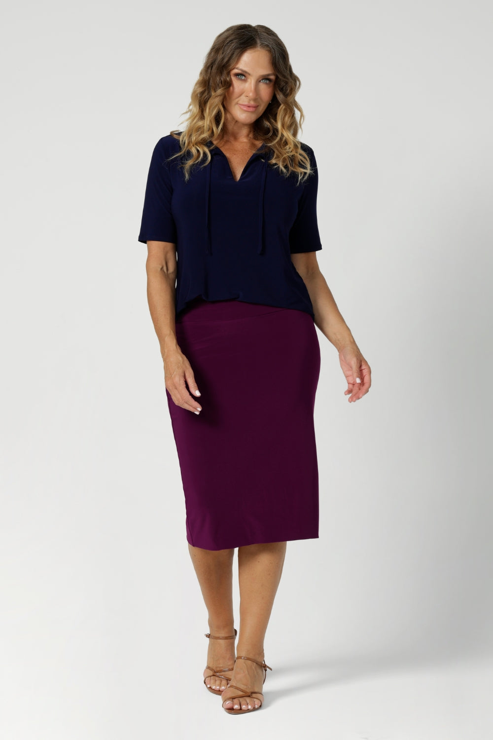 This knee-length tube skirt in a vibrant magenta is a bold and versatile wardrobe staple, crafted with care by Australian fashion brand Leina & Fleur. Featuring a double-layer design, it offers both structure and comfort. The soft, folded waistband ensures a relaxed yet secure fit, while the pull-on style makes it effortlessly easy to wear.