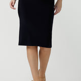 A good navy skirt for women's workwear, this stretch jersey tube skirt moulds to the curves. Great as an office skirt, this navy knee length pull-on skirt is made in Australia by Australian and New Zealand fashion brand, Leina & Fleur.