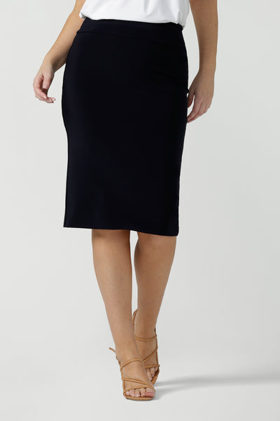 A good navy skirt for women's workwear, this stretch jersey tube skirt moulds to the curves. Great as an office skirt, this navy knee length pull-on skirt is made in Australia by Australian and New Zealand fashion brand, Leina & Fleur.