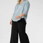 The ¾ length sleeves fall softly and are finished with narrow bound hems, bringing a refined finish to a relaxed shape. A curved shirttail hemline completes the look, offering versatility whether worn tucked in or left loose. Crafted in an easy-care woven fabric and made in Australia for women across Australia and New Zealand in sizes 8 to 24, the Arley Shirt delivers comfort, ease, and style in equal measure.