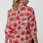 The 3/4 length soft sleeves with narrow, bound hems give the shirt a feminine, refined look, while the shirttail hemline offers a modern, polished finish. Woman's workwear shirt is made from eco friendly Tencel twill fabric. Made by Australian Designer Leina & Fleur in sizes 8-24.