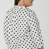 The playful black spots add a touch of personality and fun to the classic white blouse, keeping it modern and versatile for both work and casual outings. Easy care, easy wear design requires minimal fuss, so you can move through your day with ease, while its crisp, clean lines ensure you look polished and put together. Available in size 8-24.