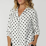 This elegant pull-on shirt offers a sophisticated yet comfortable style, perfect for everyday wear. Featuring a semi-fitted cut, it provides a flattering shape without being restrictive. The collar neckline adds a classic touch, while the subtle tuck details below the back neckline bring a refined, tailored look. Its 3/4 length soft sleeves are finished with narrow, bound hems for a neat, polished finish. 