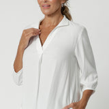 A soft tailored shirt with 3/4 sleeves, collar neckline and shirttail hem. Pull on shirt is made in Australia of sustainable tencel fabric. Soft and easy care workwear for women for petite to plus size 8-24. 