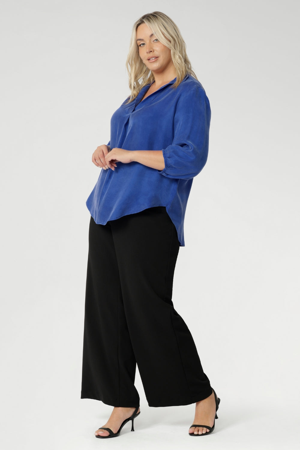 The Arley Shirt in Vivid Blue is a modern wardrobe staple that blends understated elegance with all-day comfort. Crafted from a luxurious suede-touch Tencel fabric, this buttonless, pull-on style offers a clean, contemporary silhouette that’s perfectly suited to office dressing and beyond. The semi-fitted shape creates a flattering line through the body, while the classic collar adds a sharp, structured touch.
