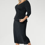 Elevate your workwear wardrobe with this stylish midi skirt, designed to flatter and move with you. Crafted from navy printed dry touch jersey fabric. Women's workwear skirt features a bias-cut design that drapes beautifully, creating an effortless, fluid silhouette that’s both flattering and comfortable. 