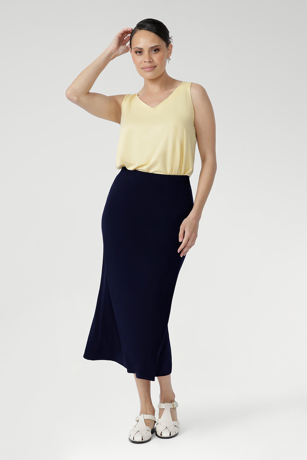 The Asher Skirt is crafted from our signature dry-touch stretch jersey, offering a comfortable, flexible fit that flatters every shape. With an easy pull-on elastic waist and a refined A-line silhouette, it’s the perfect skirt for effortless styling from work to weekend. Proudly designed and made in Australia, this is a wardrobe essential for modern women on the move.