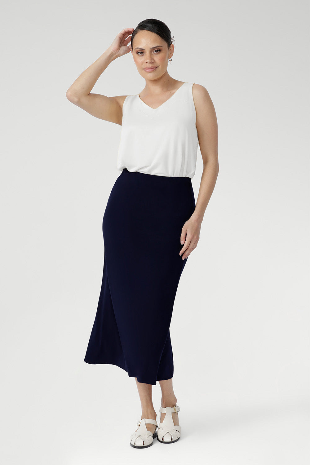 Crafted from our signature dry touch stretch jersey, the Asher Skirt offers a comfortable, streamlined fit with an easy pull-on, elasticated waist, and a refined A-line shape. 