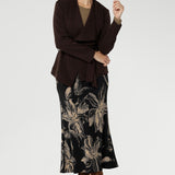 Designed without pockets and left unlined for a clean finish, the Asher Skirt offers a flattering shape with back darts for gentle structure. Size 10 model wears her printed floral skirt with matching coffee coloured top & brown jacket.