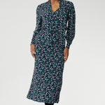 The A-line silhouette gives it just the right amount of flow, with no lining or pockets to interrupt its clean lines. Made in Australia for women across Australia and New Zealand in sizes 8 to 24. Over 30's woman wears her printed Asher with Neck Tie Top.