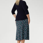 A soft internal elastic waistband ensures a smooth fit, while subtle darts at the back create gentle shaping through the waist and hips. The A-line silhouette gives it just the right amount of flow, with no lining or pockets to interrupt its clean lines.