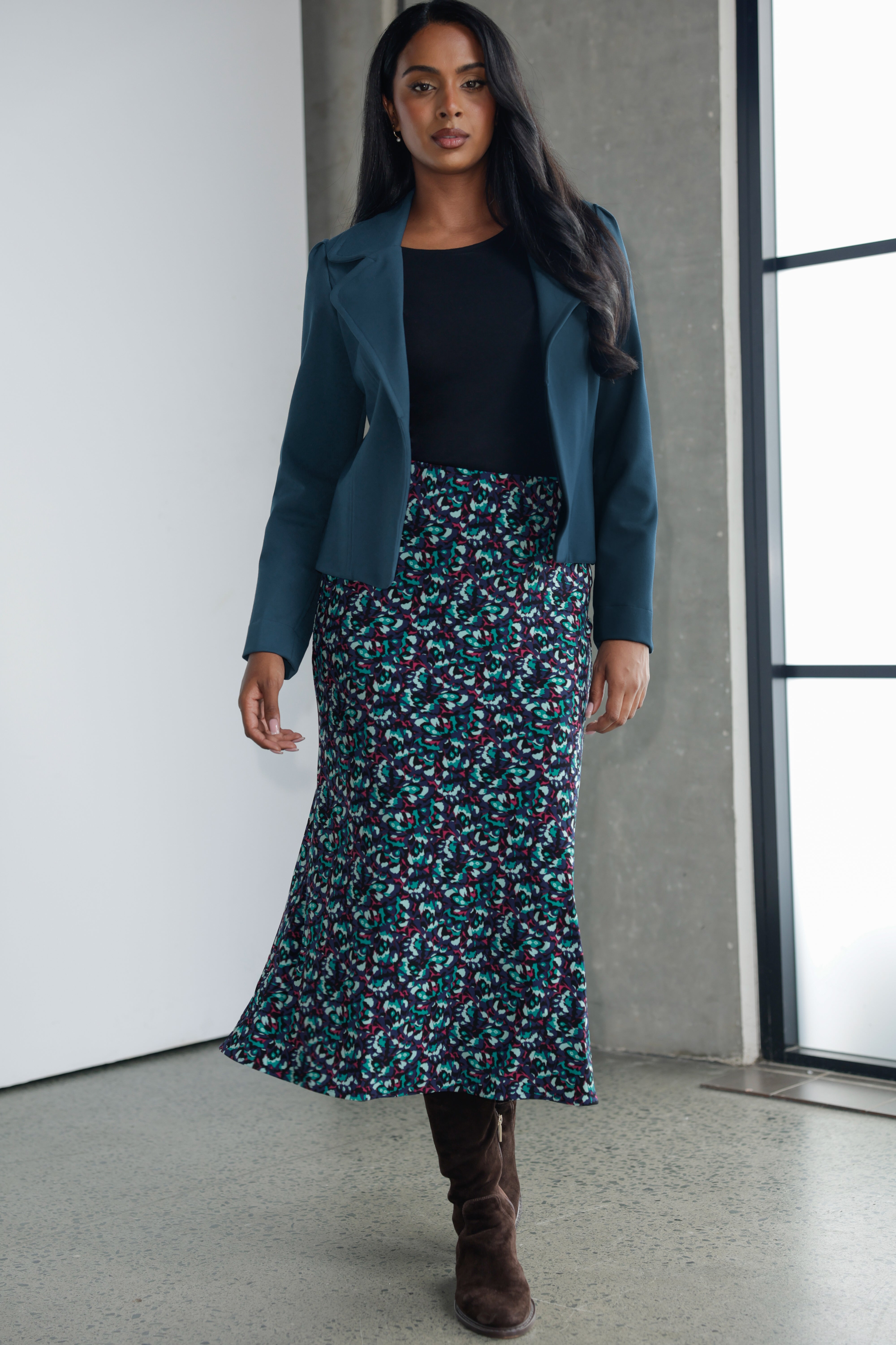 The Asher Skirt is the kind of wardrobe piece that effortlessly blends comfort with polish, making it just as suited to relaxed weekends as it is to more elevated moments. Designed with travel in mind, this midi-length skirt glides easily over the body thanks to its bias cut, offering a fluid drape that flatters without clinging.