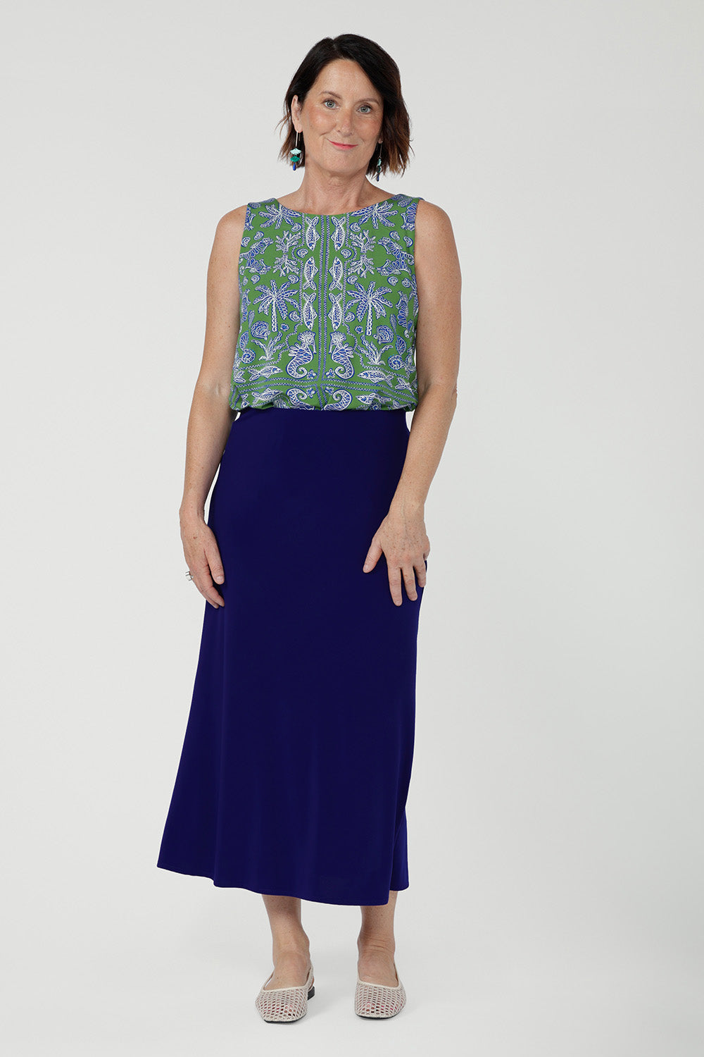 Crafted from our signature dry touch stretch jersey, the Asher Skirt offers a comfortable, streamlined fit with an easy pull-on, elasticated waist, and a refined A-line shape. 