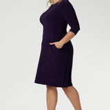 A comfortable workwear dress for petite to plus size 8-24. Curvy plus size women wears workwear dress for women in size 18. Easy care fabric is Australian made for women in Australia & New Zealand.