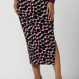 Close up of the Alula Midi skirt in Alula. Styled back with a black heel size 8 - 24. 