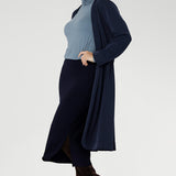 Elevate your wardrobe with the sophisticated Andi Midi Skirt in Navy, designed to keep you both work- and event-ready. Crafted from a navy dry-touch jersey fabric, this skirt offers a soft stretch for all-day comfort.