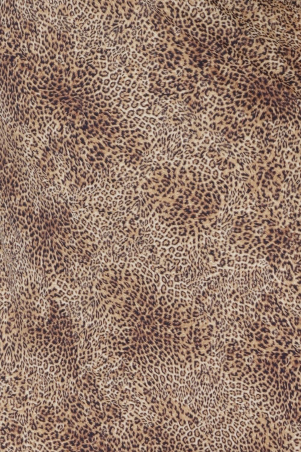 Swatch image of Baby Animal print, on a soft-touch jersey base with print details in shades of cream, caramel, brown and graphite. This fabric provides soft stretch and has been used to craft The Joel Pants & the Asher Skirt. Leina & Fleur proudly stock sizes 8-24 in this collection, while stocks last.