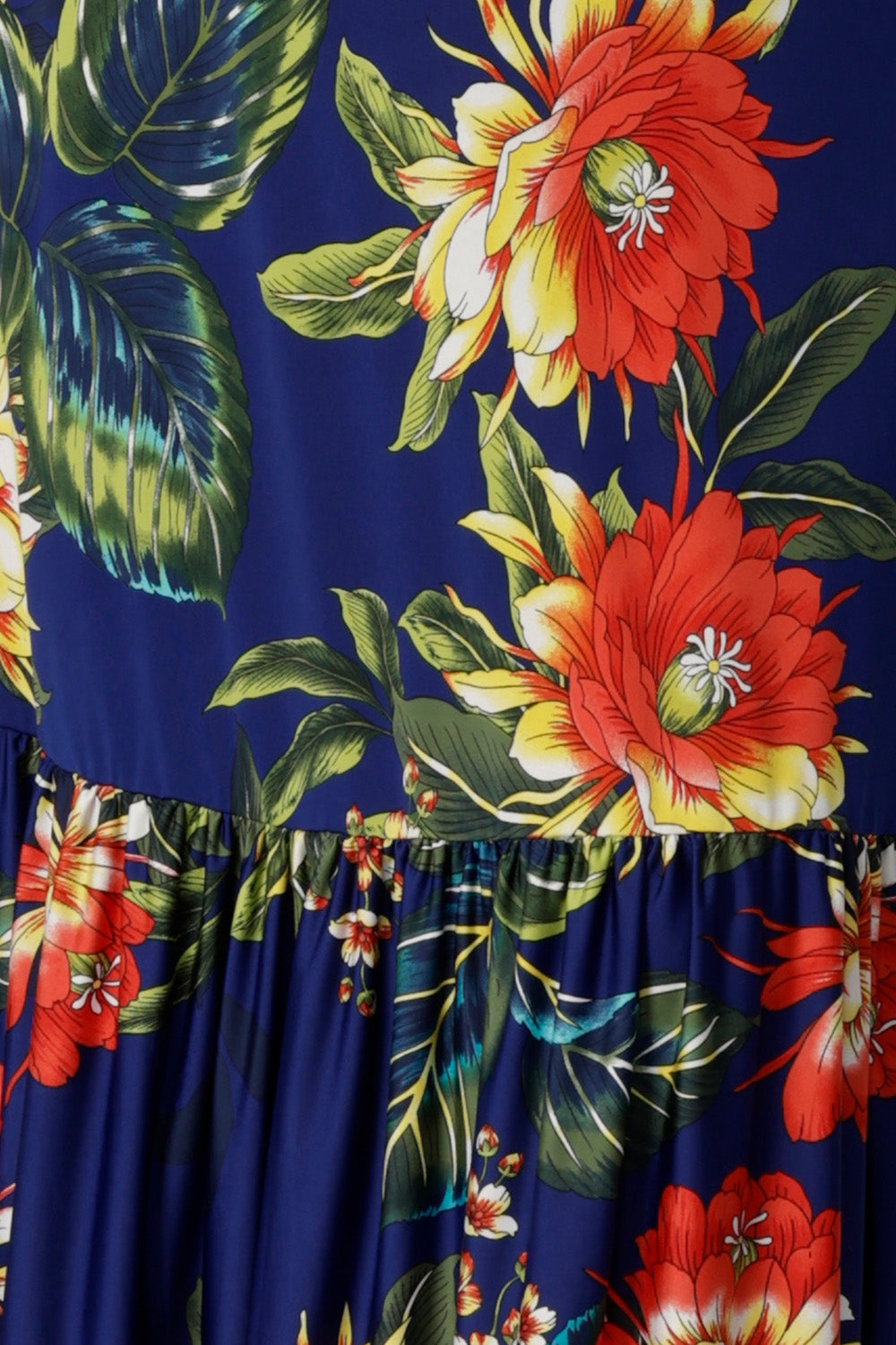 Swatch of Bahagia floral print used to create travel ready dresses and tops. Easy care and wrinkle resistant slinky jersey fabric was used by Australian and New Zealand women's clothing brand Leina & Fleur. Sizes 8-24.