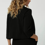 The Benni Jacket is the perfect piece to elevate your trans-seasonal wardrobe, offering both style and versatility. Crafted from Black Scuba Crepe Jersey, this fabric combines a soft stretch with a luxurious feel, ensuring both comfort and structure throughout the day. The open-front design creates a sleek, modern look, making it easy to layer over both formal and casual outfits.