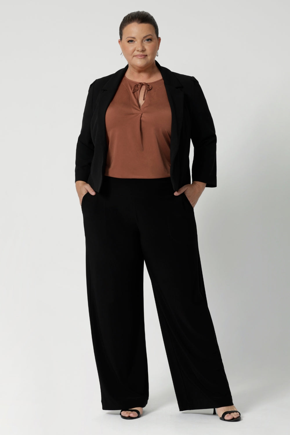 Whether paired with the matching skirt or pants, the Benni Jacket creates the ultimate power suit, perfect for making a bold and confident statement at work or at special events. Its timeless design and comfortable fit make it a versatile wardrobe staple for every modern woman.