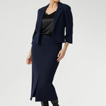 The narrow collar and notch lapels add a refined, professional edge, while the double-layer tailored front panels enhance the jacket's sharp silhouette. On the inside, you'll find a phone pocket on the inner left side—subtle yet practical, keeping your essentials secure and out of sight.