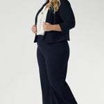 The double-layered front panels contribute to the structured, tailored silhouette, enhancing the overall sense of refinement. Available in sizes 8-24. Match with your Drew Pants in Navy for a full suiting look.